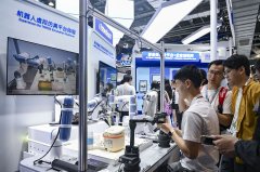 <b>记者陈浩明摄人工智能财产合作已从单一手艺比</b>